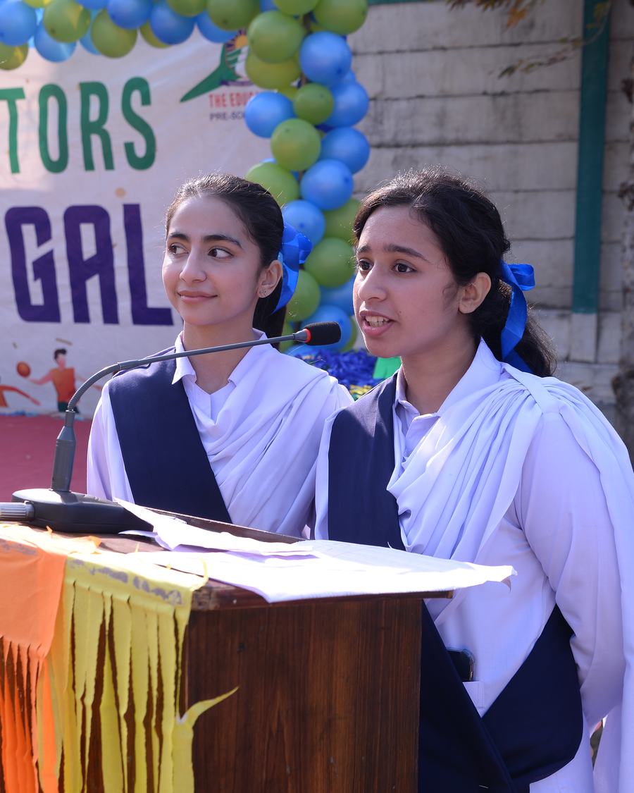 Two students giving the opening speech at the Sports Gala